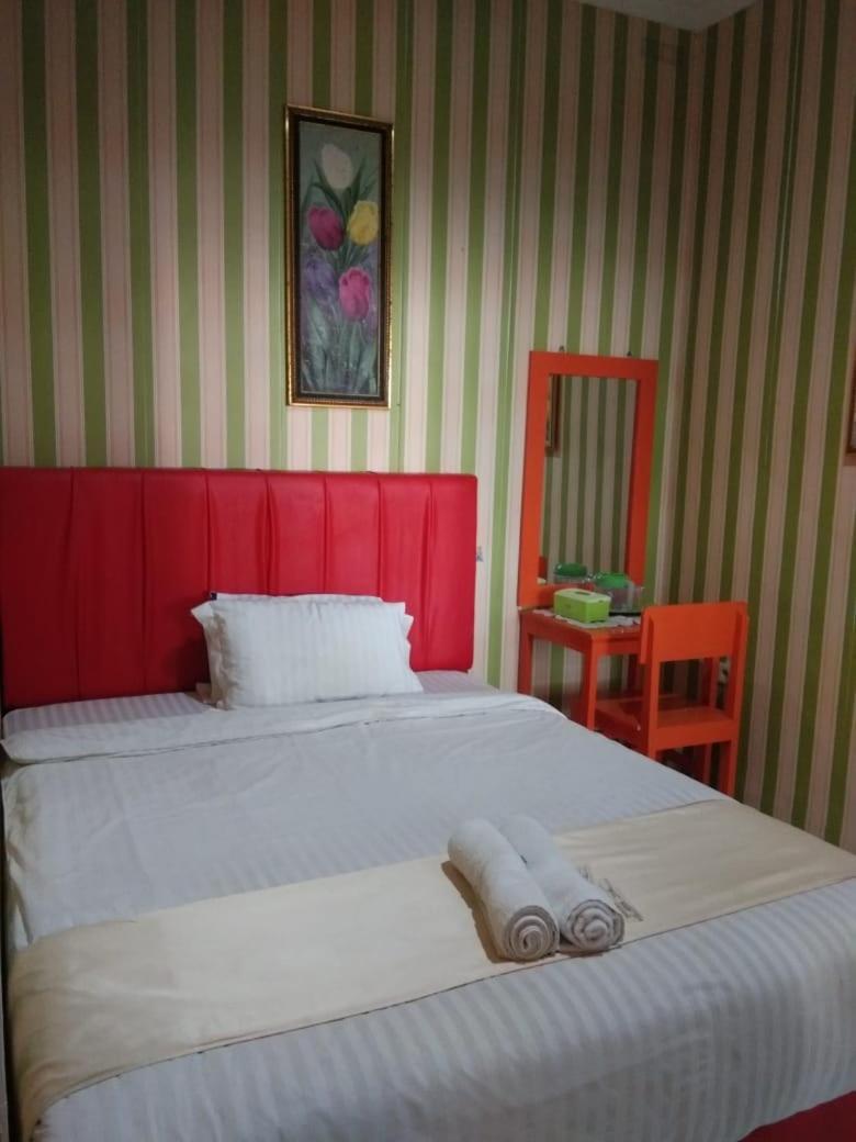 Hotel Krui Syariah Екстер'єр фото